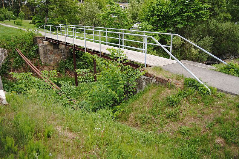Buvęs Pėžaičių siaurojo geležinkelio tiltas. Wikipedia.org nuotr.