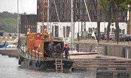 Virš krantinių - juodi debesys