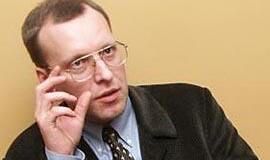 N. Puteikis - ant dviejų kėdžių