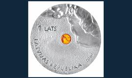 Latvija išleido monetas su gintaro gabalėliais