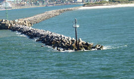 Apie trijų uostų ir tilto statybą