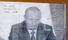 Pokštavimas su Vladimiro Putino nuotrauka rusams gali baigtis už grotų