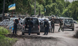 Kijevas: Luhansko oro uoste ukrainiečių pajėgos kaunasi su Rusijos tankų divizijos daliniais