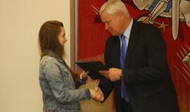 Savanorių apdovanojimas pas Merą