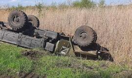 Rusija gali savanoriškai išvesti karius iš Ukrainos: