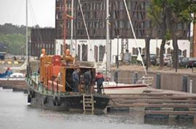 Virš krantinių - juodi debesys