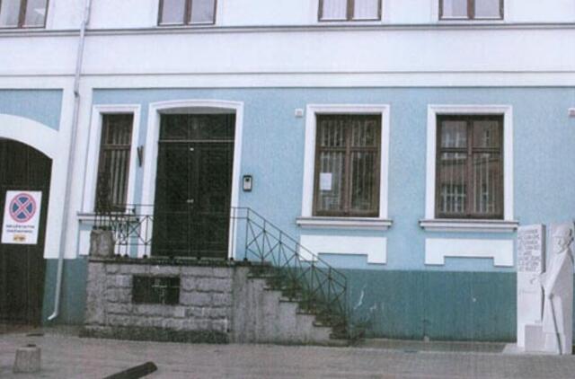 Žmogus su rudu peruku