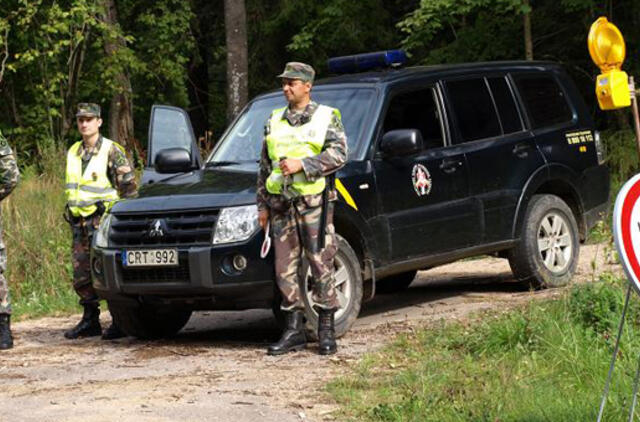 Saugantis kiaulių maro keliaujantieji iš Baltarusijos bus dezinfekuojami