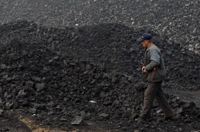 Per gaisrą Kinijos šachtoje žuvo 21 žmogus