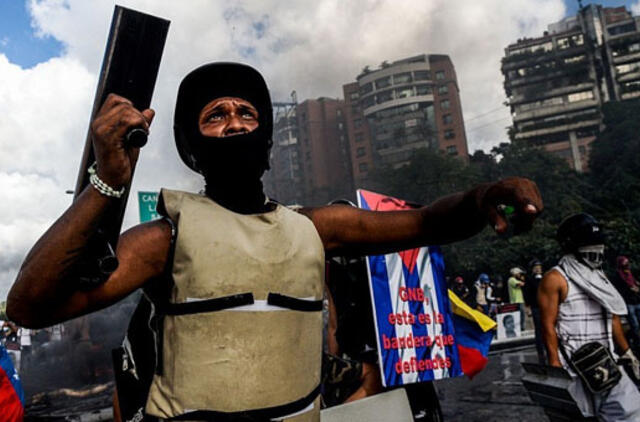 Padėtis Venesueloje: masiniai protestai nėra naujas reiškinys, bet šįsyk išskirtinai daug smurto