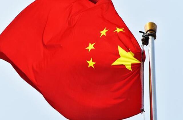 Kinijoje moteriai skirti vieneri metai kalėjimo už tai, kad ji nuslėpė Covid-19 simptomus